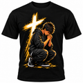 Black kids T-shirt with a praying young believer kneeling beneath a radiant golden cross